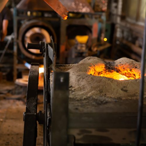 Foundry - ferrous metal is melted in an induction furnace of a metallurgical plant