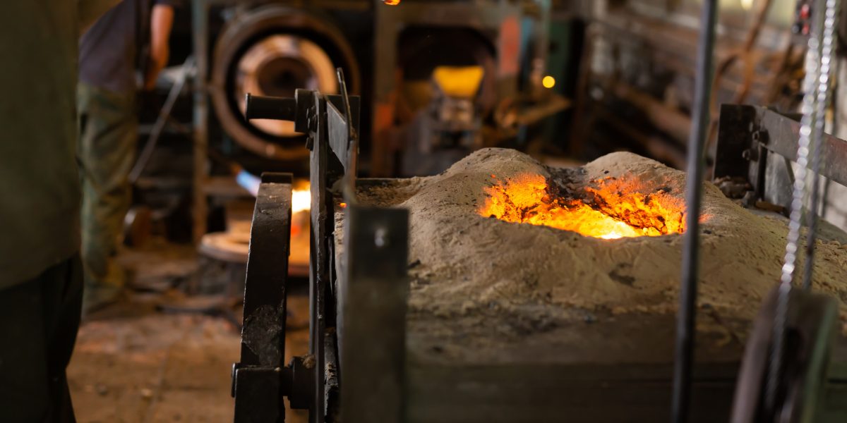 Foundry - ferrous metal is melted in an induction furnace of a metallurgical plant